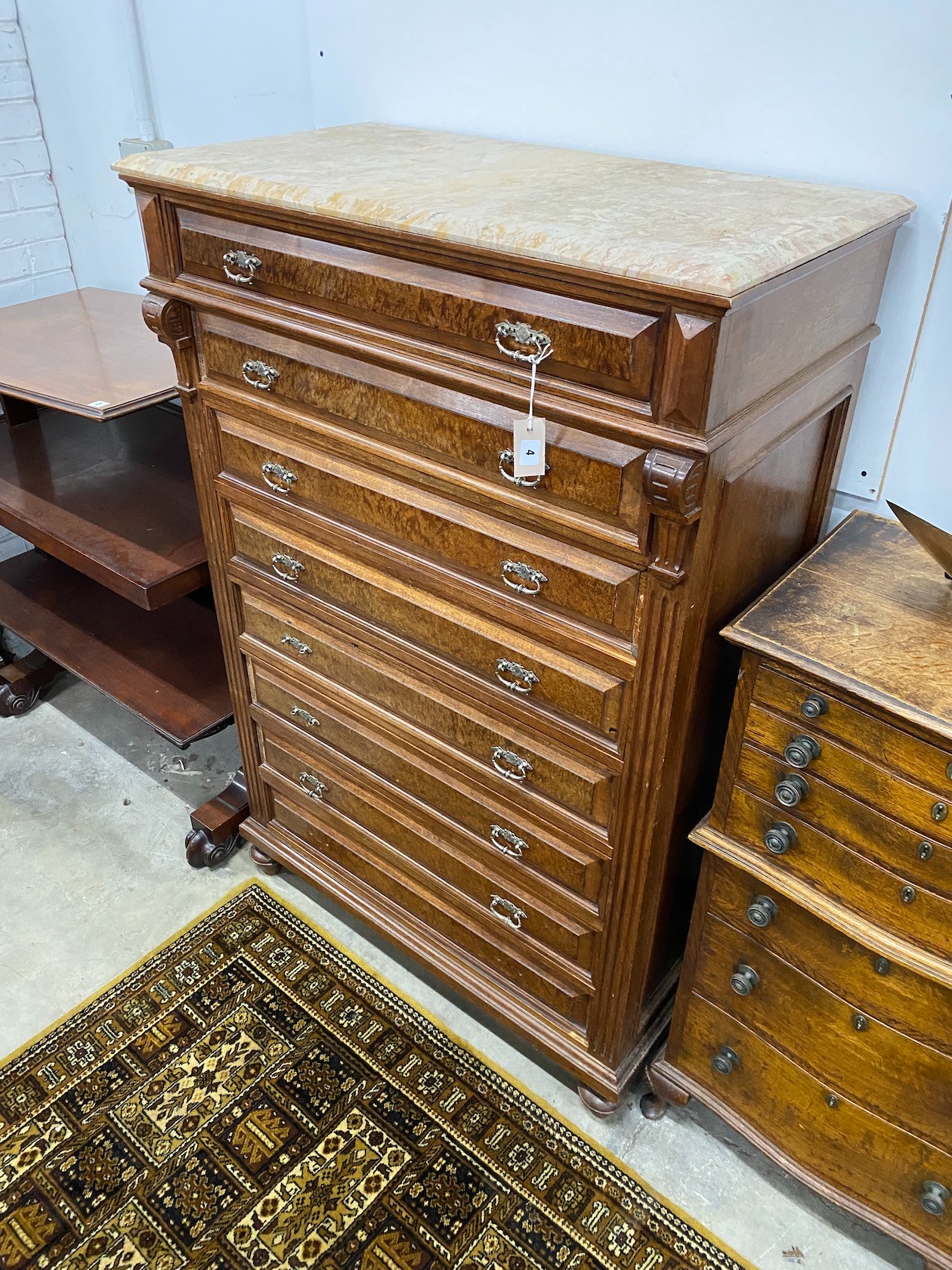 An early 20th century French marble topped eight drawer tall chest, width 94cm, depth 49cm, height 144cm